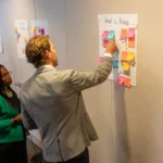 Democratizing Data Pathways Through Partnerships to Enhance Community Well-Being